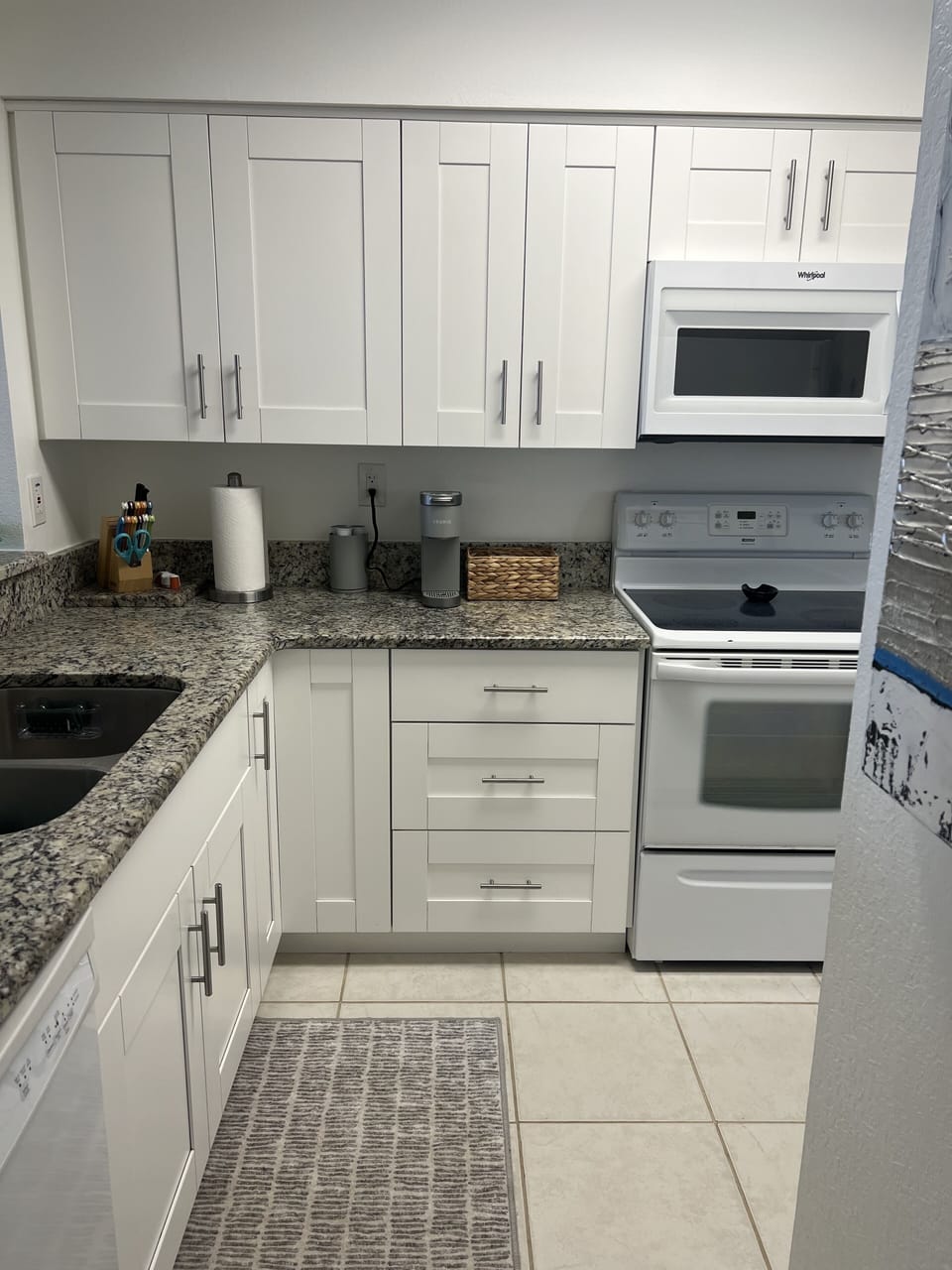 Fully stocked kitchen with plenty of basic supplies to begin your stay