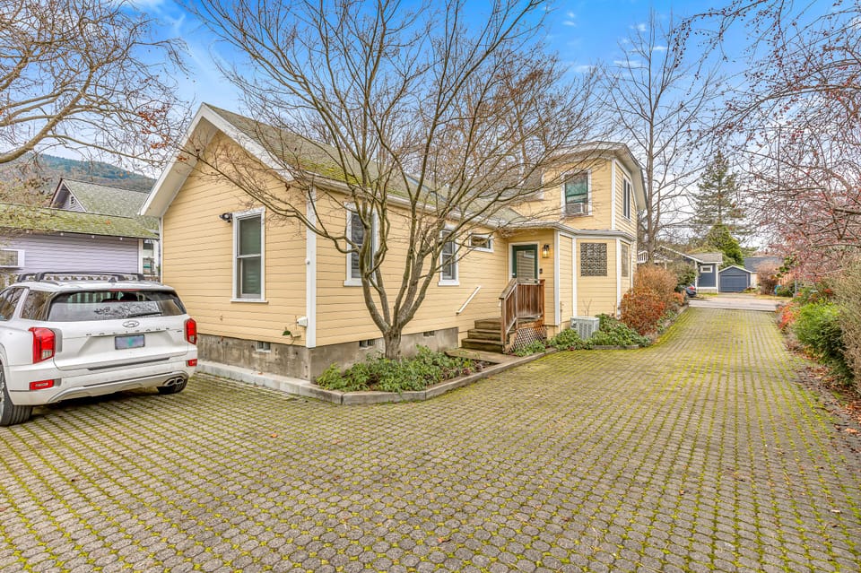 This is the parking area that separates the front house from the studios. The parking spots are reserved for the front house and studio A guests. Studio B has street parking.