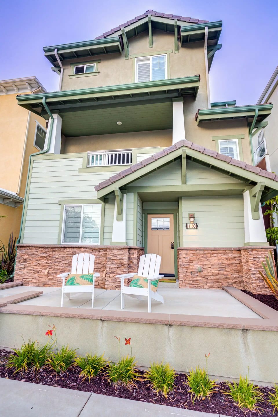 Front porch with Adirondack chairs at our Pismo Beach ocean view vacation rental