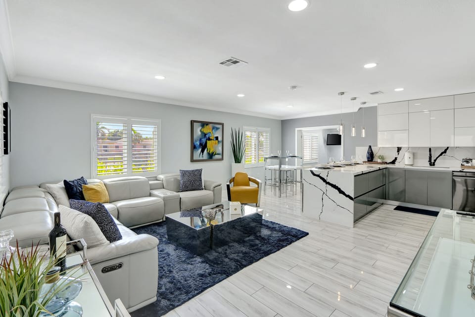 Living Room | lends a warm welcome and flows into the luxurious kitchen