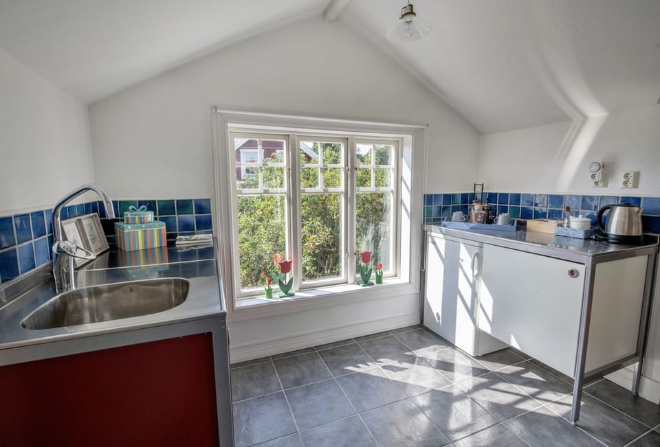 Upstair pentry with coffee/tea facilities and small fridge.