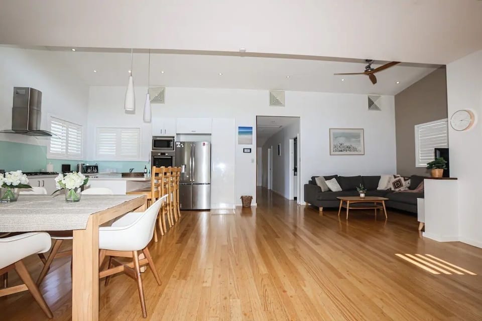 Open plan lounge, dining and kitchen area.