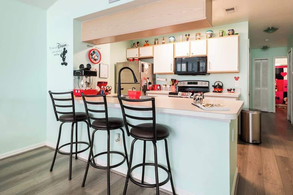 Breakfast bar seating near the Kitchen area.
