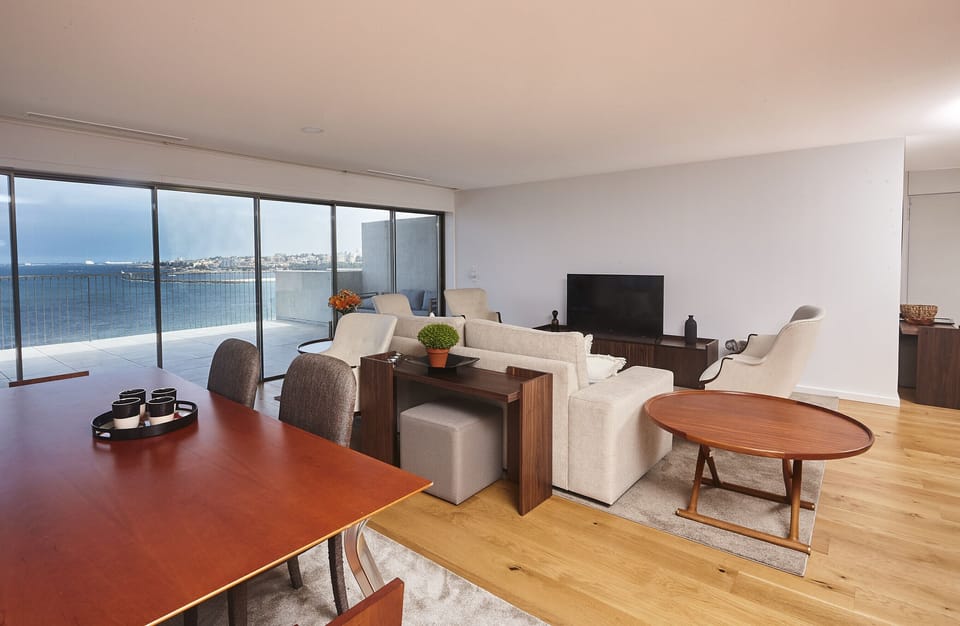 Living room, TV and ocean view.