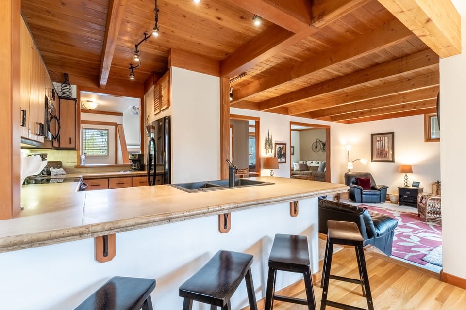 Seating for 4 at the breakfast bar.