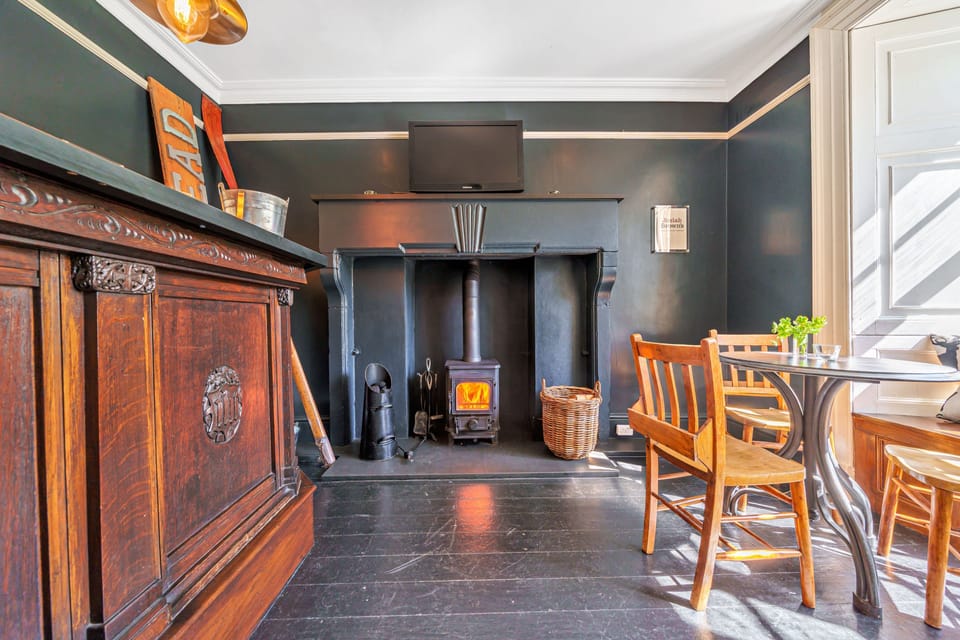Josiah Brown's pub warmed by a log burner.