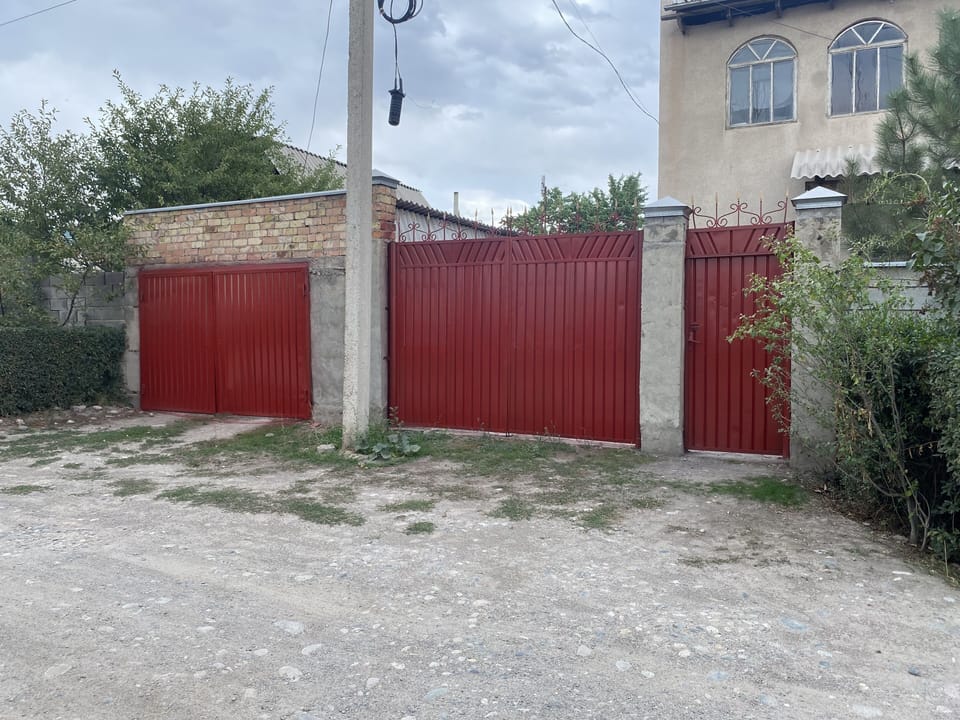 The front of the house ( left side is covered garage)