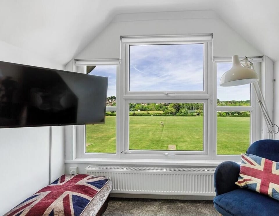 Gorgeous views from the lounge across the playing fields towards Hythe and Saltwood