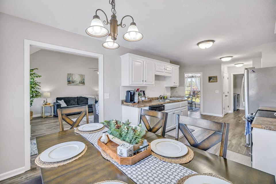 Dining area with a view of the kitchen and the living area.