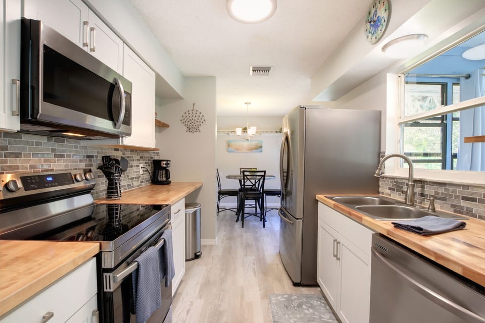 Completely remodeled kitchen -butcherblock countertops & all new appliances.