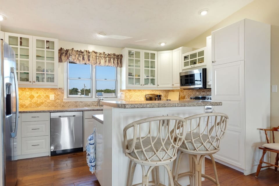 Whip up something delicious in the large Kitchen with updated appliances and plenty of prep space.