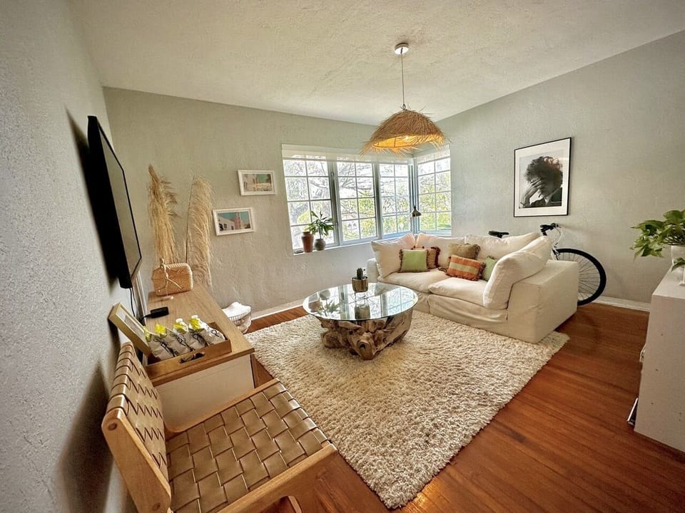 Living room with Restoration Hardware Cloud Couch, Smart TV, WiFi and Netflix