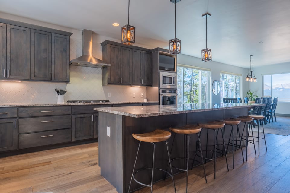Tons of seating at the kitchen island and dining area