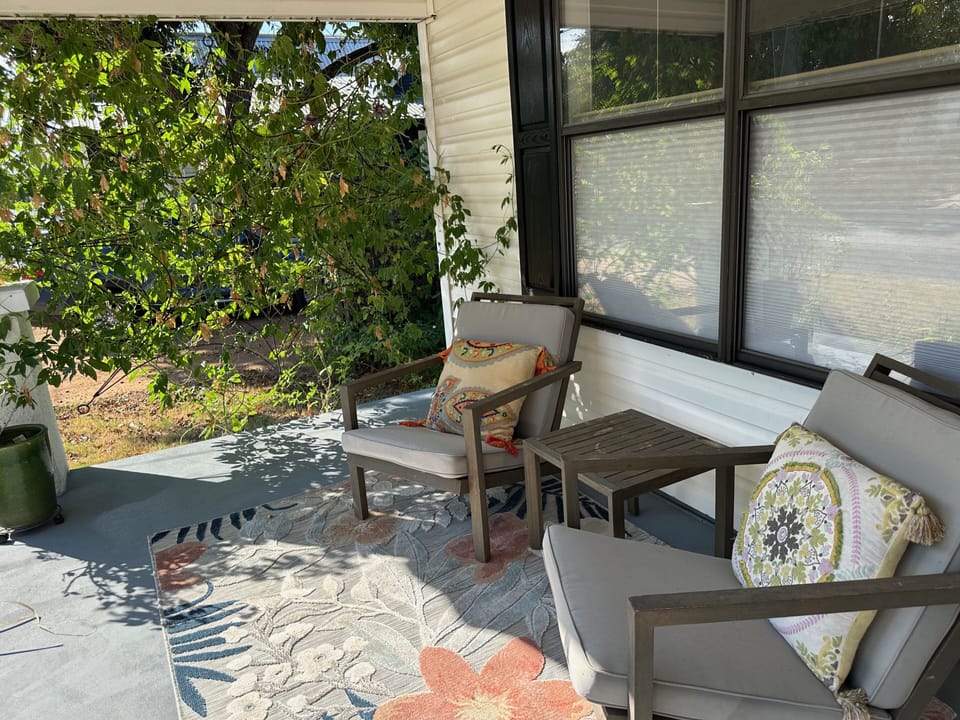 Front porch where you can sit outside and enjoy your favorite beverage. 