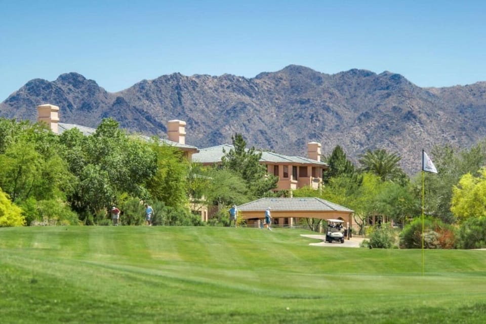 Soak in sweeping mountain views over lush fairways.