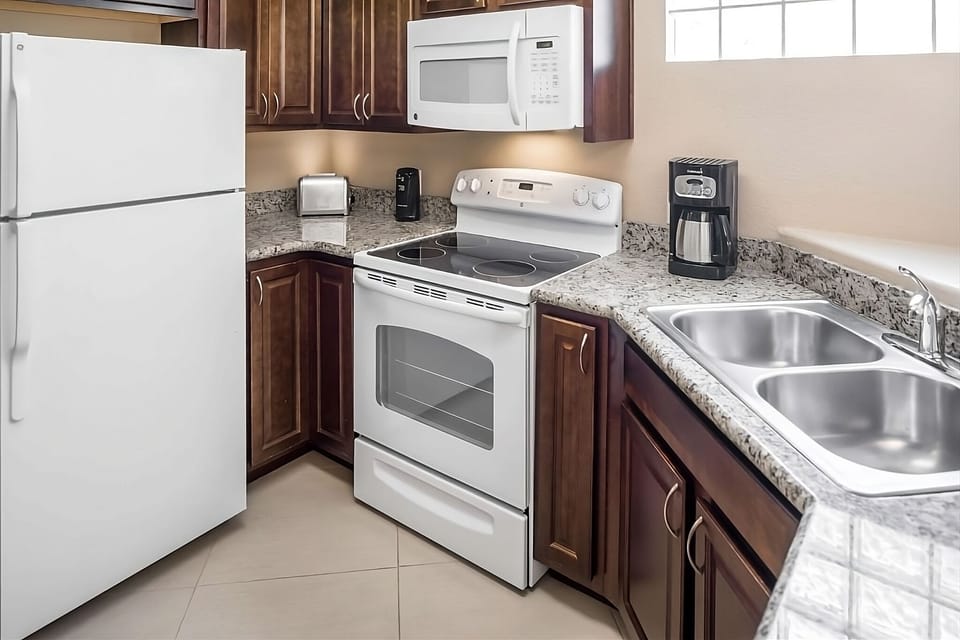 Cook with ease using full-size appliances and granite counters.