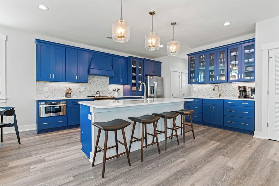Kitchen with Bar Seating on Third Level