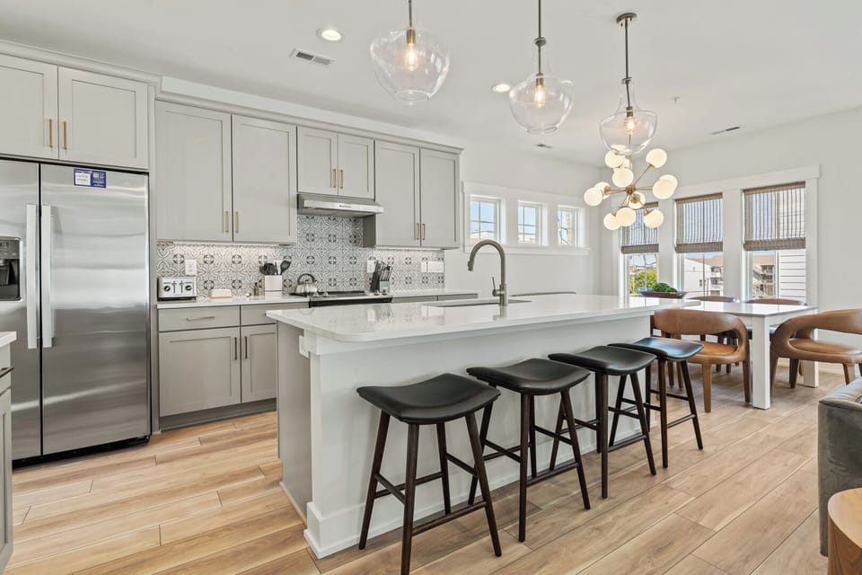 Kitchen with Bar Seating on Third Level