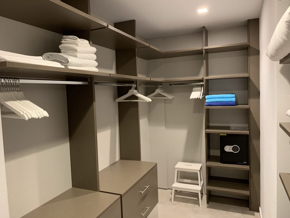 walk-in wardrobe with safe and kettle for ....