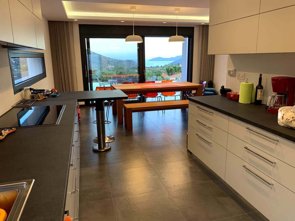 and an open-plan, fully equipped, modern kitchen, ....