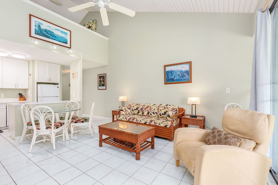 The living room features an upgraded sofabed, providing additional sleeping space for guests.