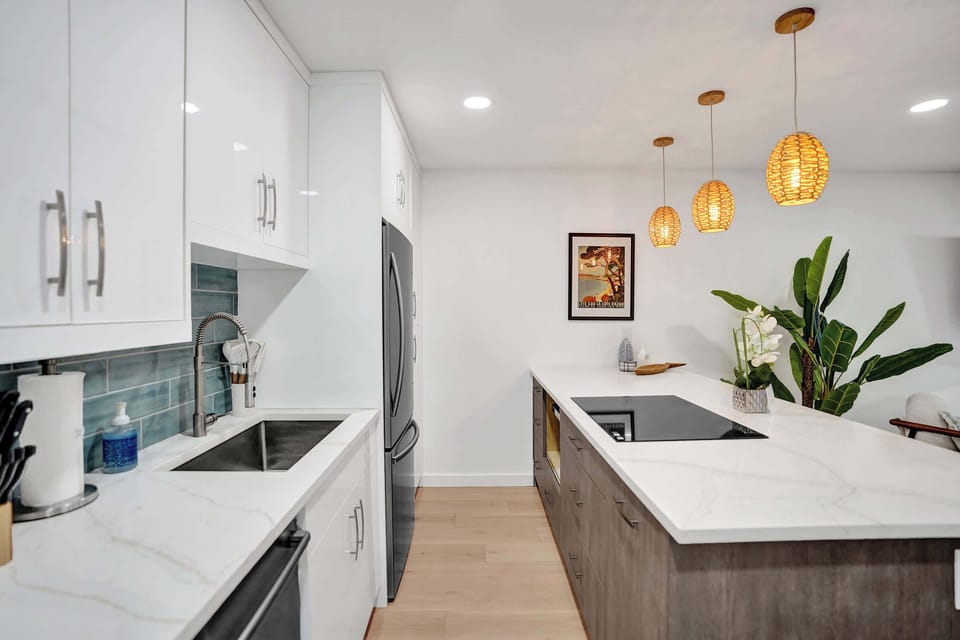Kitchen is complete with kitchen wares and has brand new built-in designer appliances.