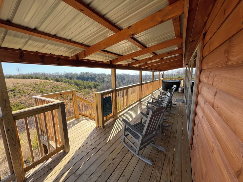 Covered porch and hot tub
