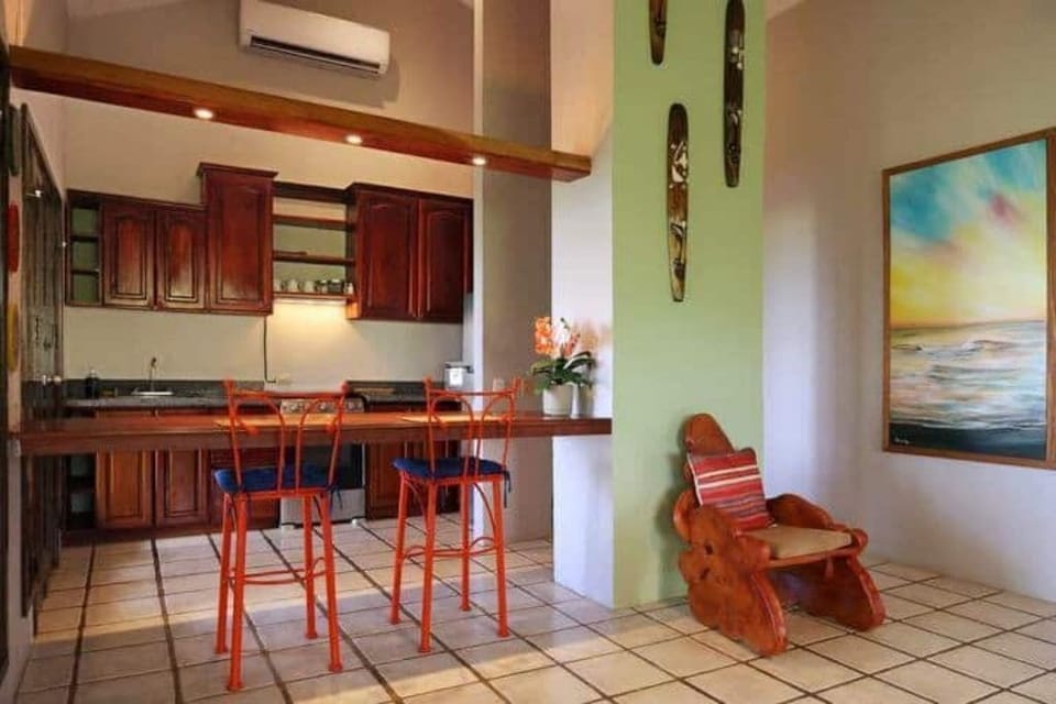 Jungle side living room and kitchen