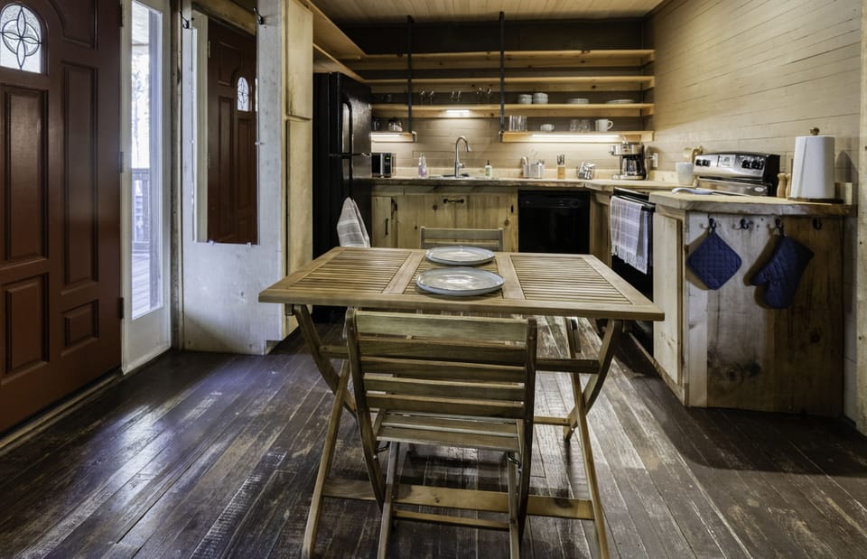 Foldable dining table and chairs can be brought in during cold weather.
