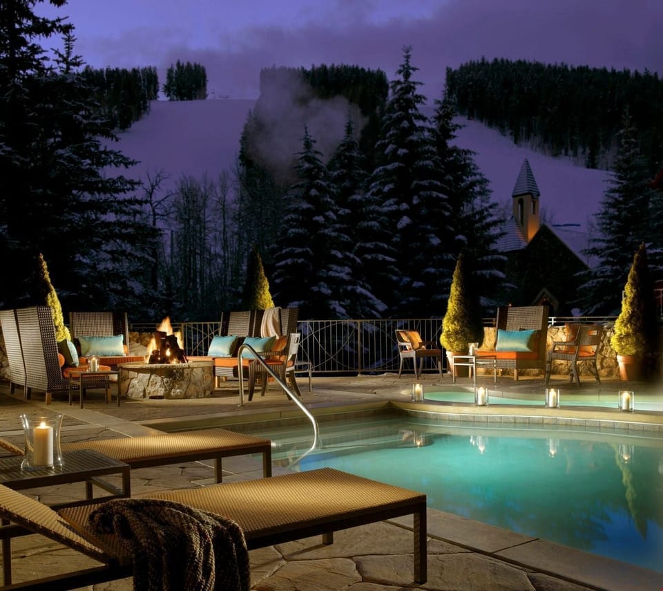 Lounge by the outdoor pool after a day exploring the mountain.