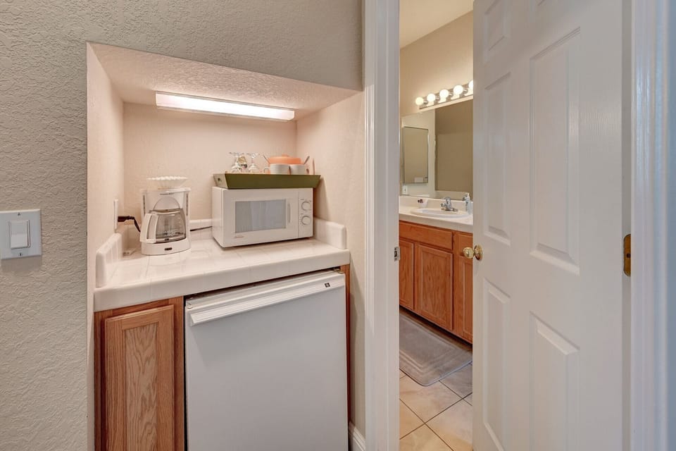 Minifridge and coffee maker in the suite bedroom.