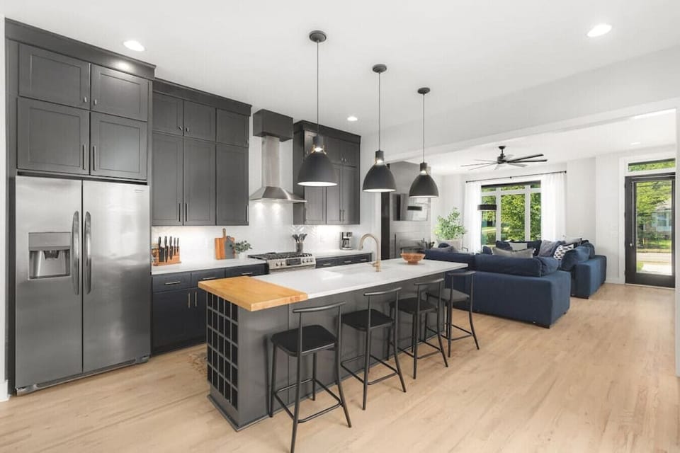 Fully-stocked, modern kitchen suitable for any chef! Seating for 4 at the kitchen island.
