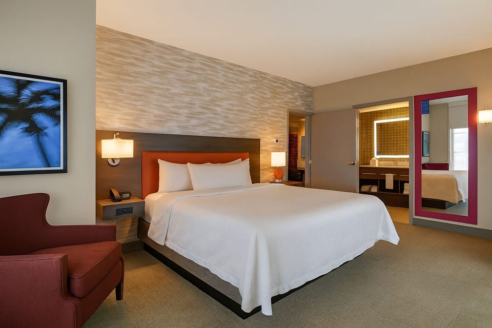 Settle into crisp linens and unwind in modern comfort.