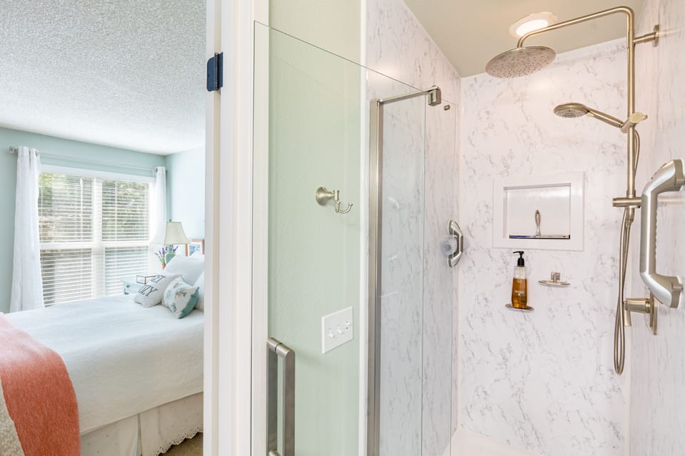 Primary bedroom's ensuite features a shower.