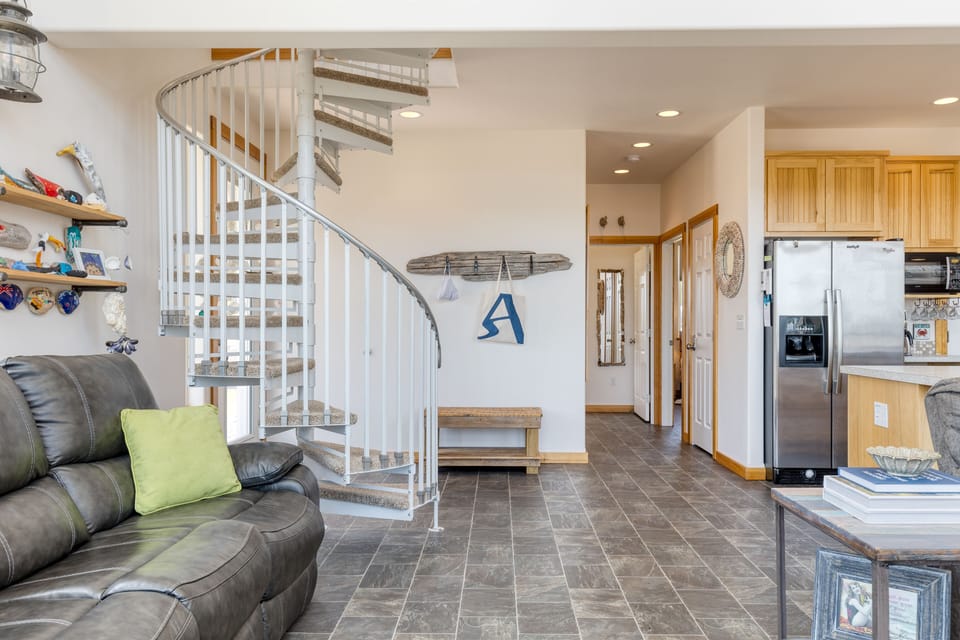 Ascend elegantly thru the spiral staircase.