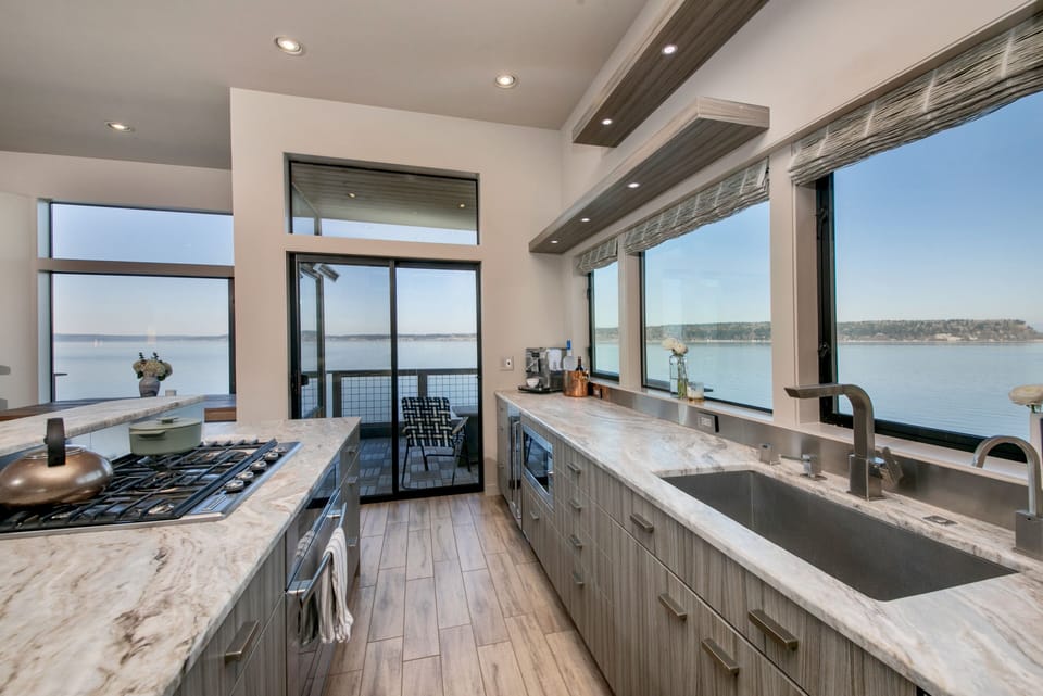 Experience culinary luxury in this modern Gray-toned kitchen.