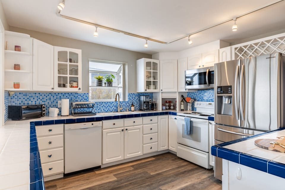 Culinary meets artistry in this fully-equipped kitchen.