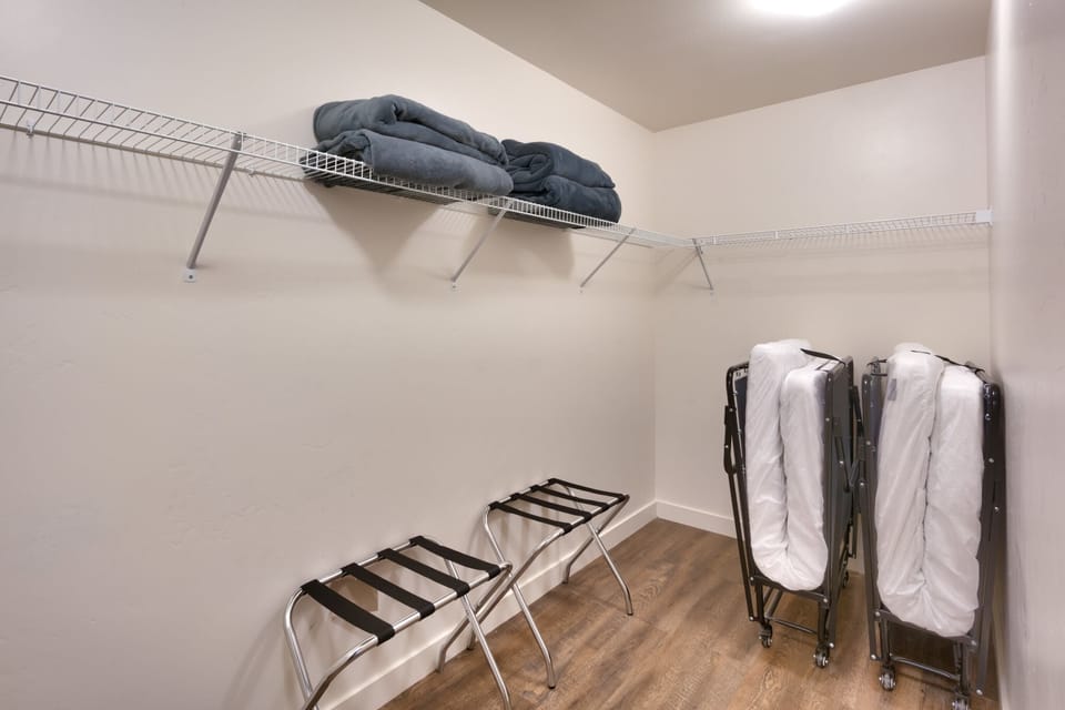 Master Walk in Closet & 2 Twin Rollaway Beds