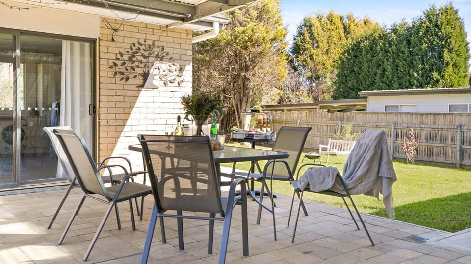 Bluebird Cottage | Alfresco dining | Enclosed yard