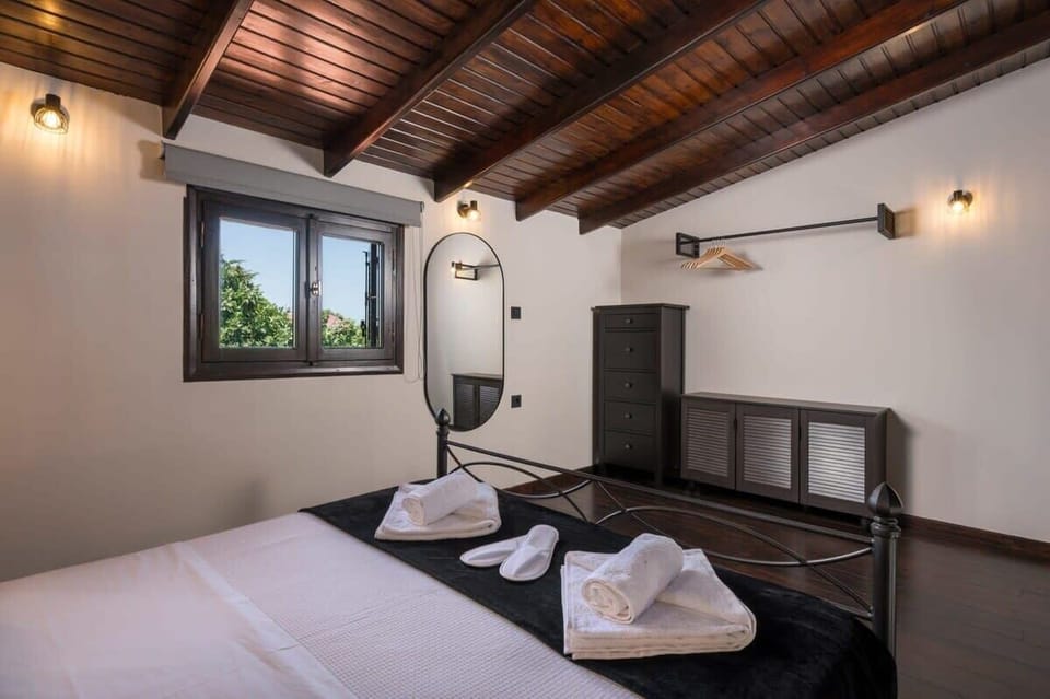 Relax in Comfort: Double Bed, Mirror, and Open Closet