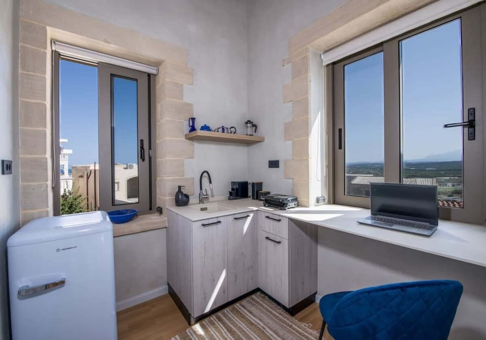 Compact and Stylish Kitchenette Within the First-Floor Bedroom