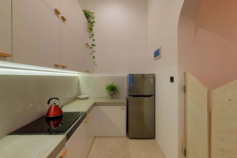 First floor Kitchen , includes stove top , fridge and all kitchen supplies