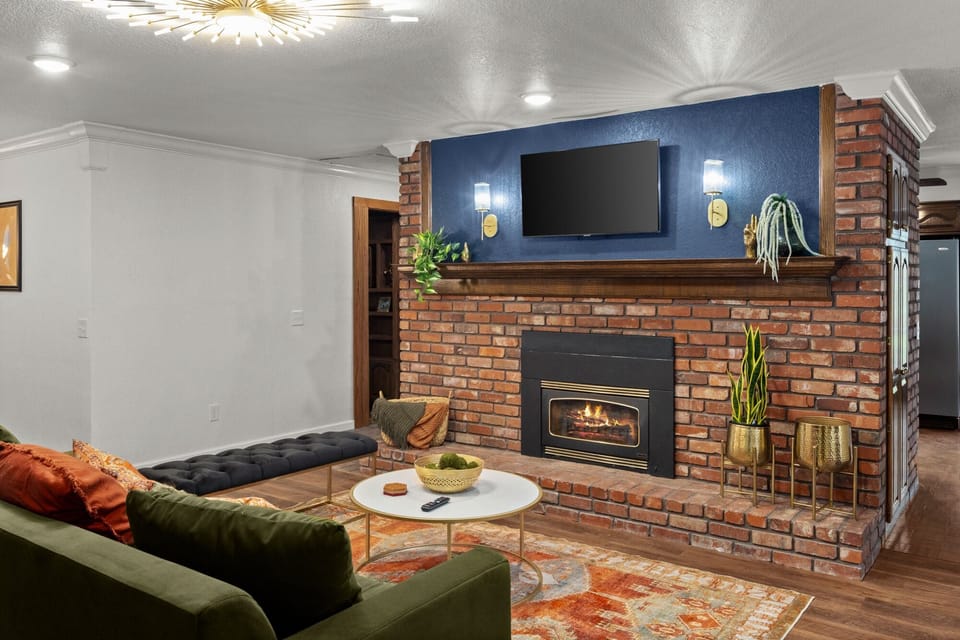 Living Room perfect for watching television, reading, or sharing stories from your day.