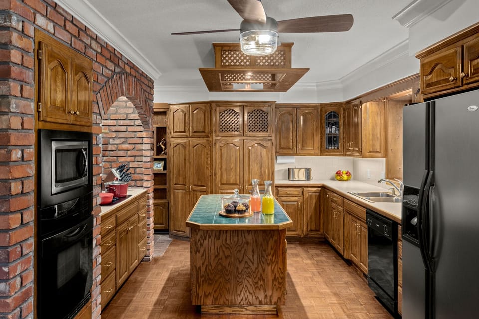 The kitchen is stocked with high quality cookware, utensils, sharp knives, and more.