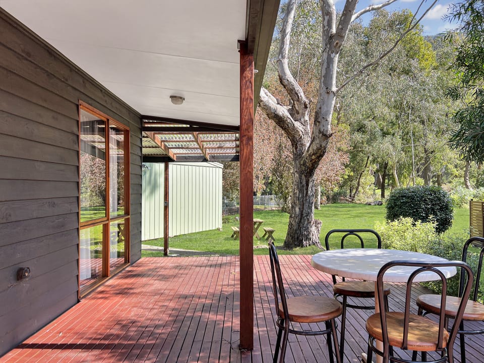 Relax on the rear deck, surrounded by nature's tranquility.