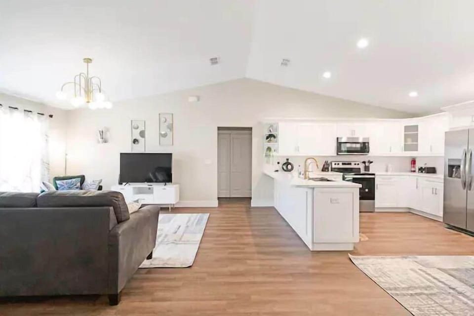 Kicthen island counter beside living area
