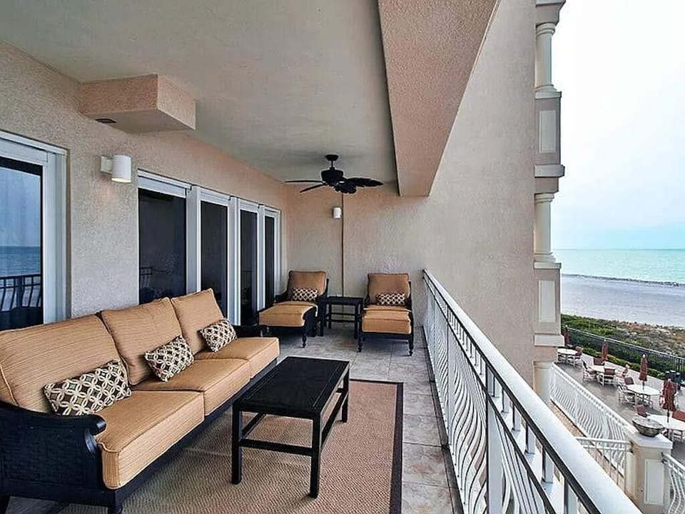 Upscale outdoor furniture with oversized cushions.