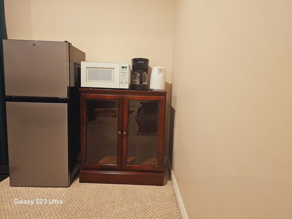 Midi fridge,Microwave ,electric  kettle and coffee maker. 