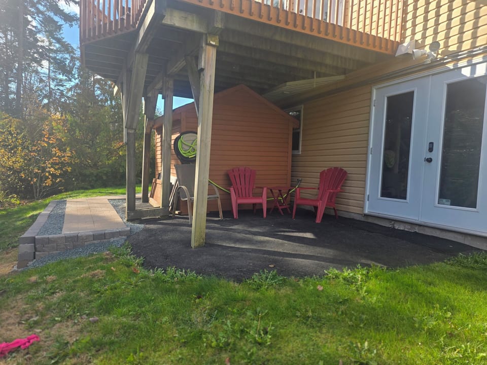 Basement entrance accessed via stone stairway 