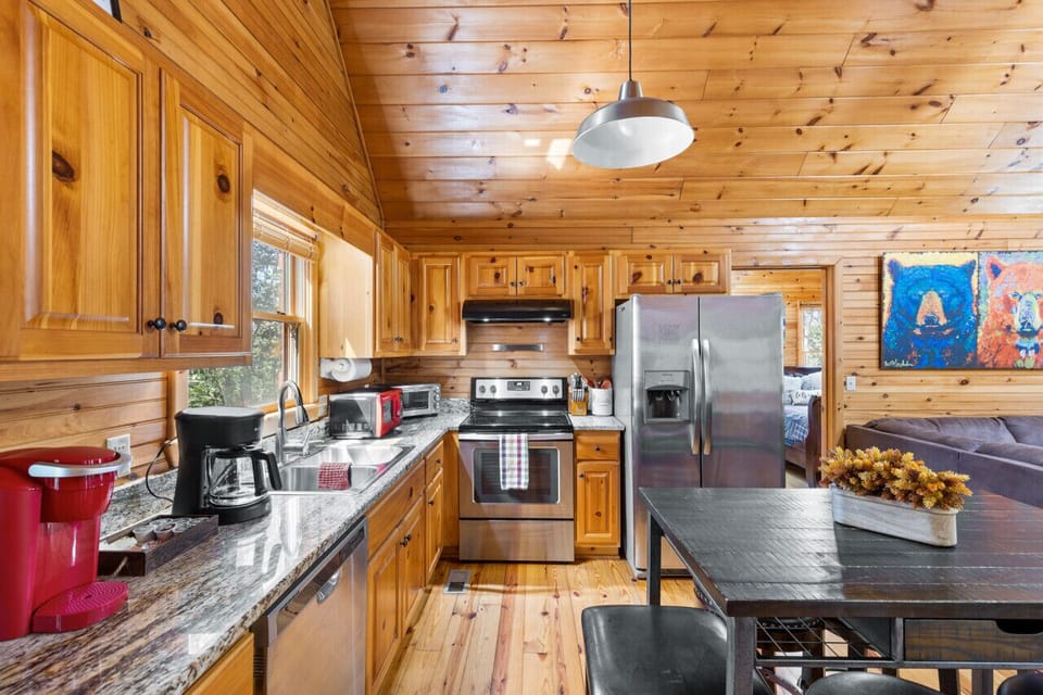 A kitchen symphony of steel precision and wooden allure.